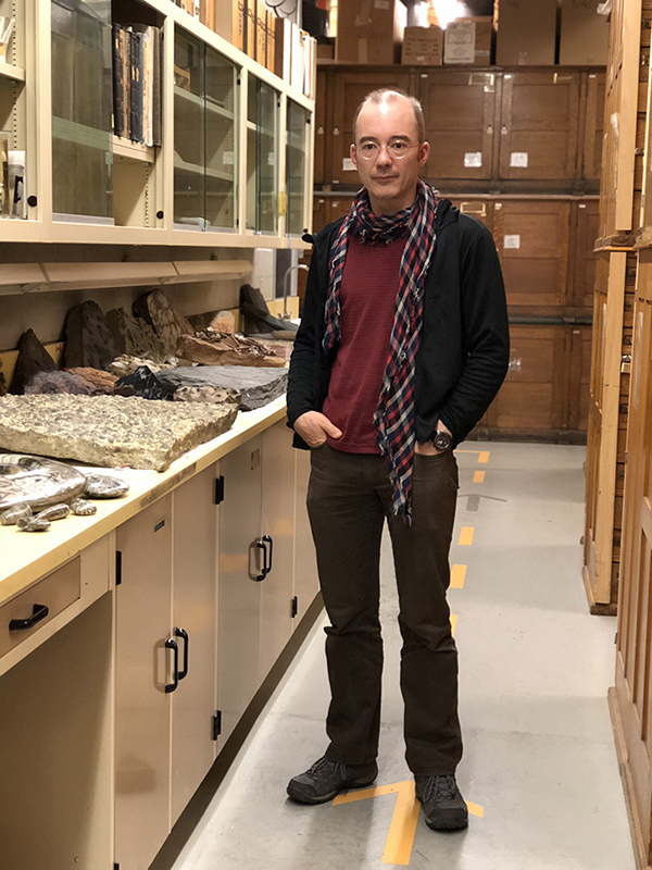 Photo of Jean-Bernard Caron in a museum.